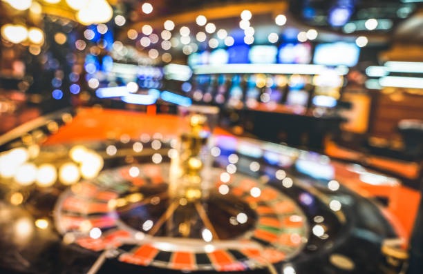 Dealer spinning the roulette wheel during a live session